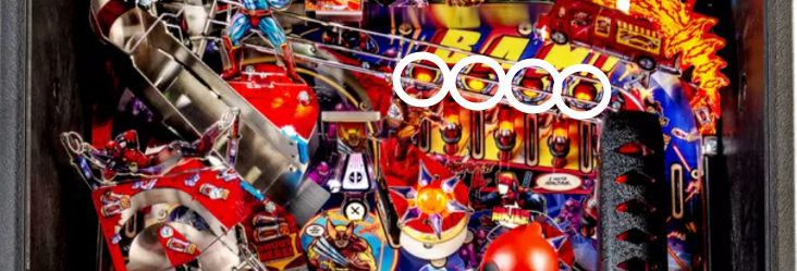 The upper half of the Deadpool pinball playfield with circles around the inlane lights. 